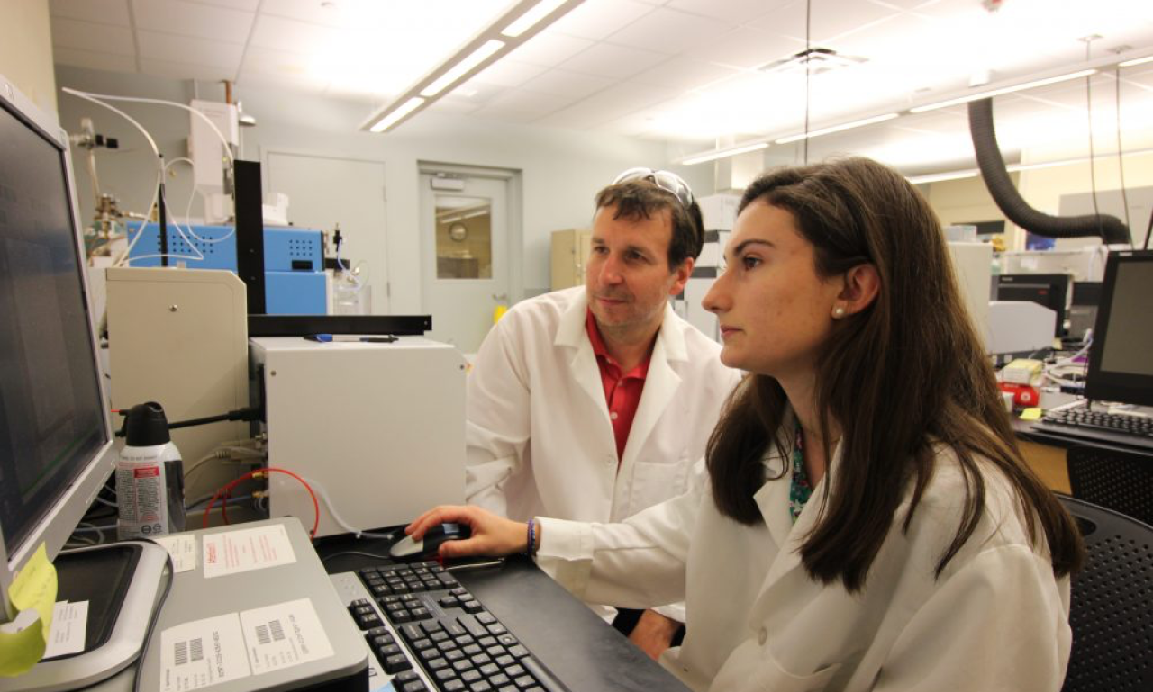 Scientists using their computer